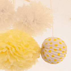 Pom poms and lanterns from The Party Parlour