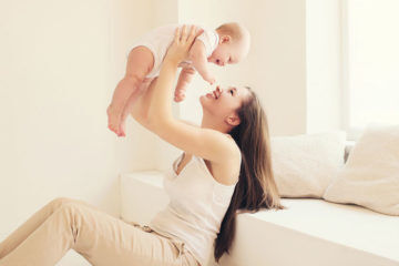 Love being a mum holding baby