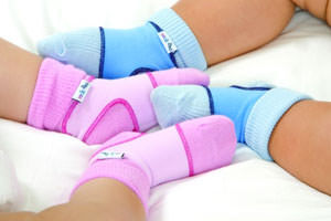 Keep baby socks on with sockons