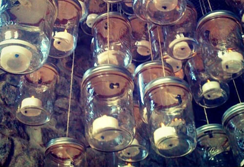 Chandelier made from candles in jars