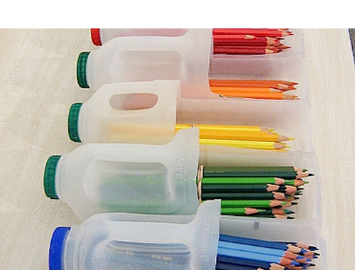 Recycle plastic milk bottles in to pencil holders