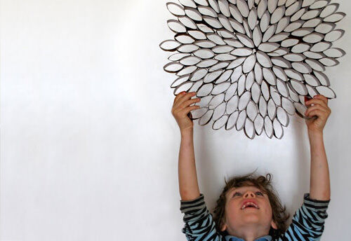 Make wall art from toilet paper rolls