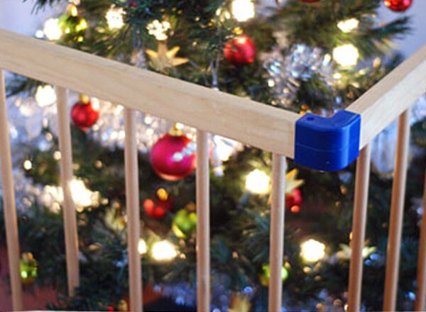 Toddler proof the Christmas tree with a baby gate