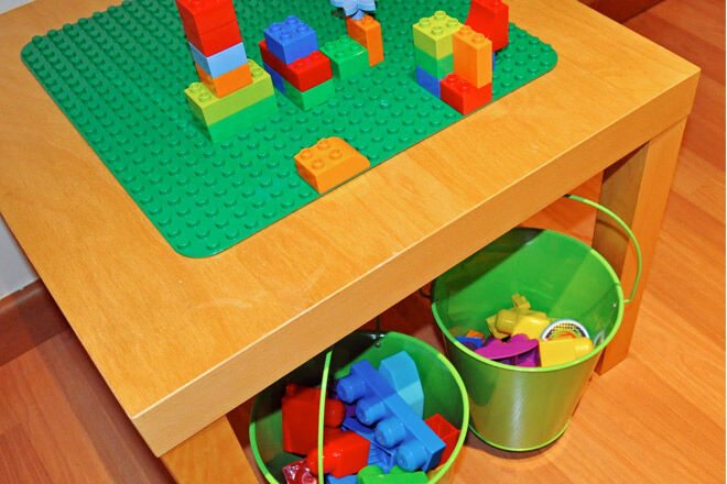 Add hooks and buckets to the LACK table for instant easy LEGO storage