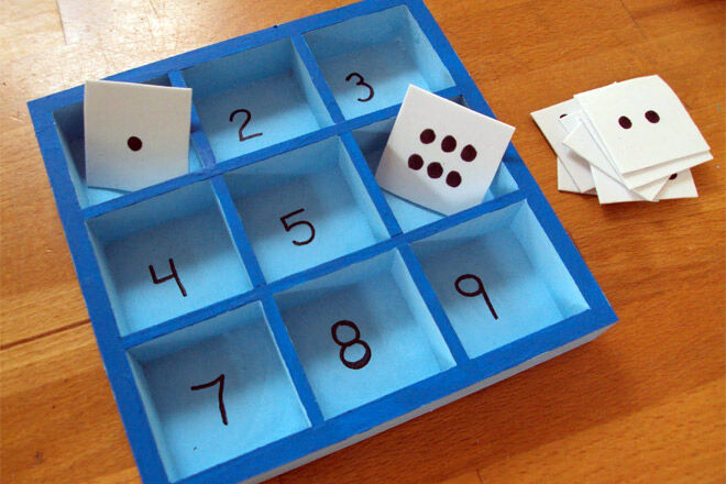 Numeracy game with boxes