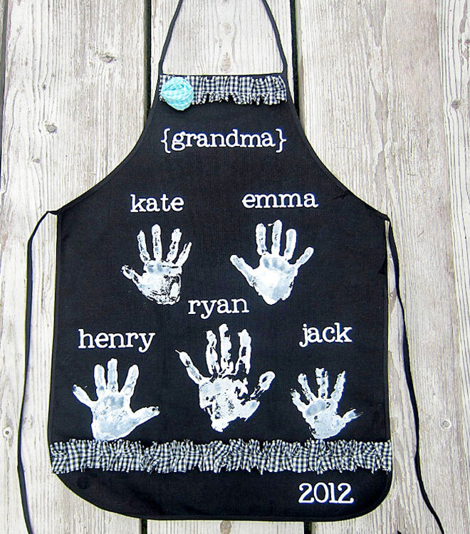A DIY apron with painted handprints of the whole family
