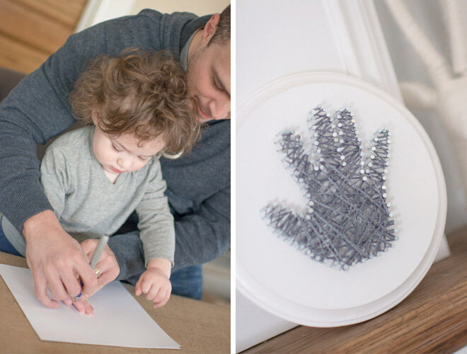 A man helping a child to trace their hand and a piece of string art made from the outline of the child's hand
