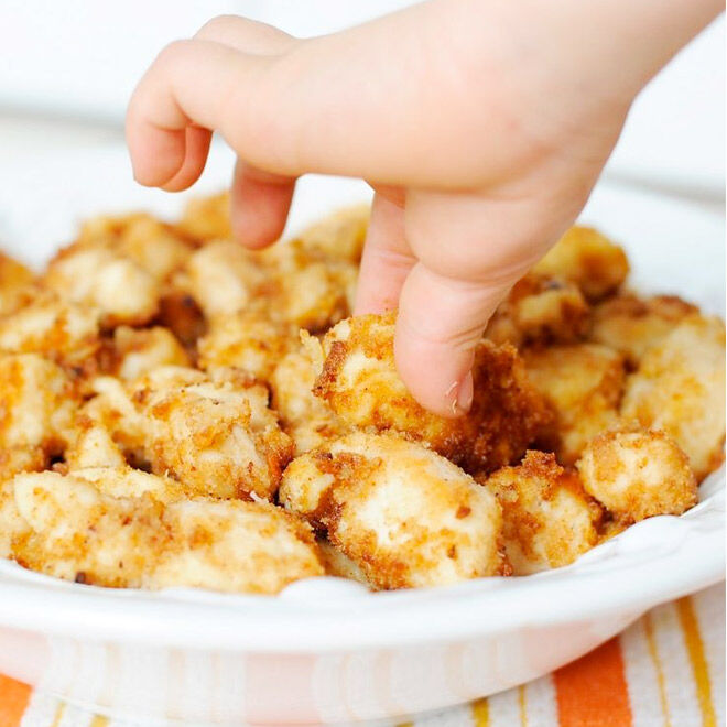 Coat chicken with coconut for super crunchy, tasty chicken nuggets!