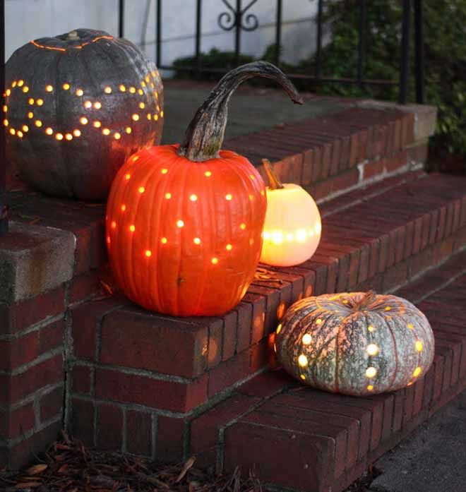 Can't calve a pumpkin? Easy - drill holes instead! Simple Halloween porch decoration.