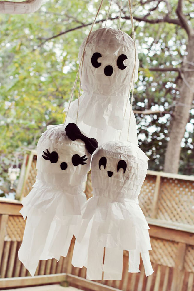 Ghosts aren't that scary when they're full of lollies. Awesome Halloween pinata idea!