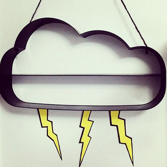 Spray-paint this cool Kmart cloud shelf black (from it's original blue hue) to make it really stand out. Then add lightning for a superhero themed room!