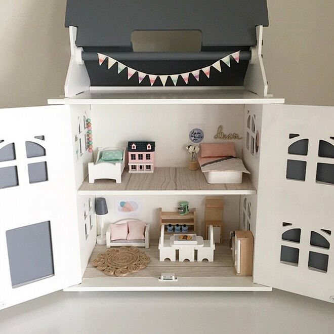 A very pink Kmart dollhouse has been sanded back and turned into a miniature contemporary dream home. LOVE