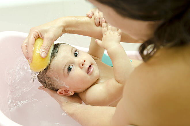 Babies only need to be washed in water so avoid drying soaps that can make cradle cap worse
