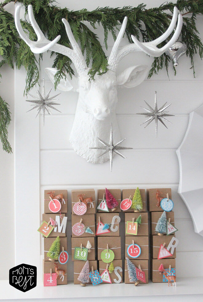 Grab a bunch of mini gift boxes, string, numbers and some little ornaments to make this advent calendar.