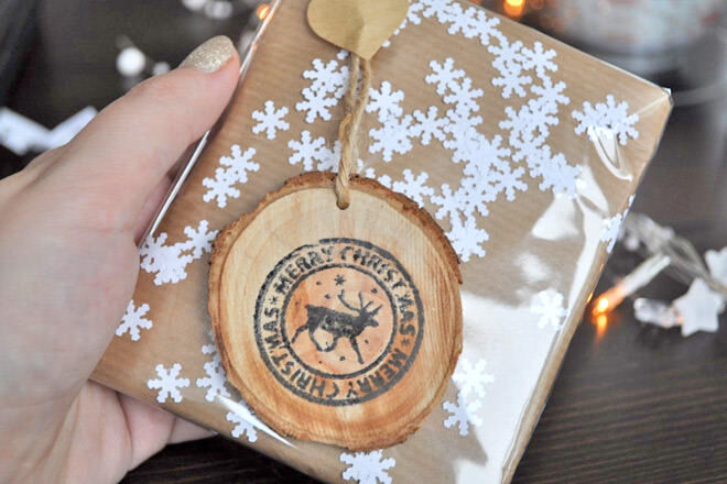 Wrap your present in brown paper and then add your crisp paper snowflakes between the brown paper and a layer of celophane. Easy peasy