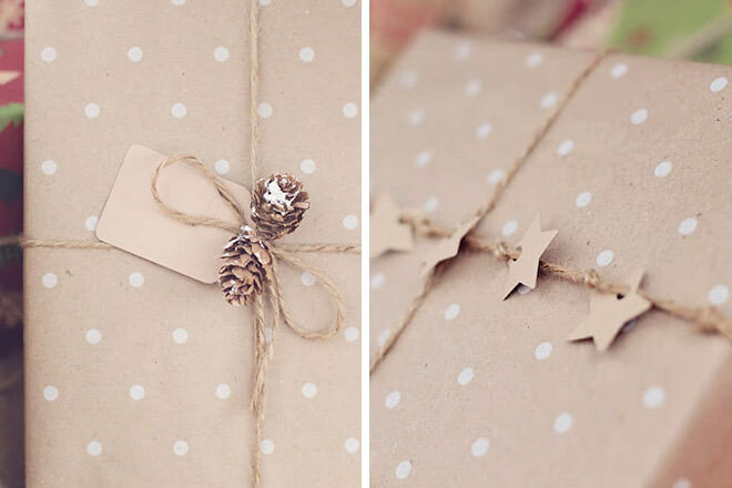 Simple star and pine cone Christmas gift wrapping with brown paper