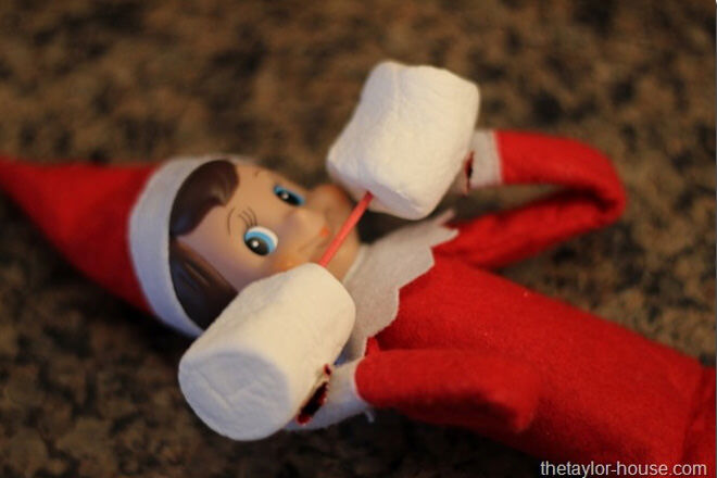 Elf on the Shelf lifting weights