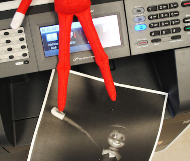 Elf on the Shelf photocopying at the office