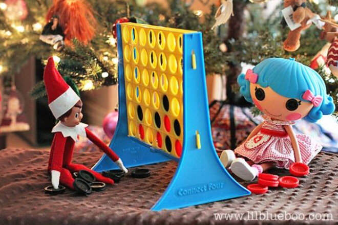 Elf on the Shelf playing Connect 4