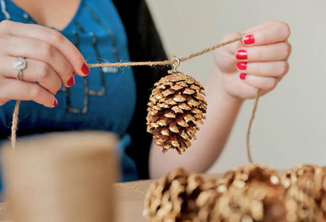 Add a little gold paint to pinecones for a fancy garland