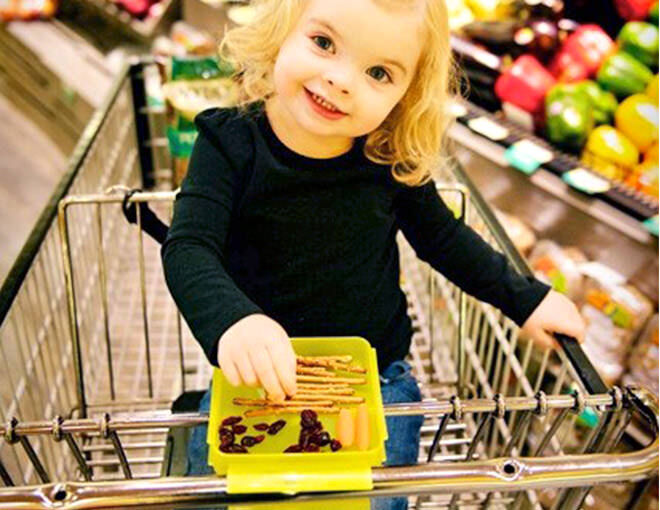 The trolley snack tray makes shopping with a peckish little one so much easier