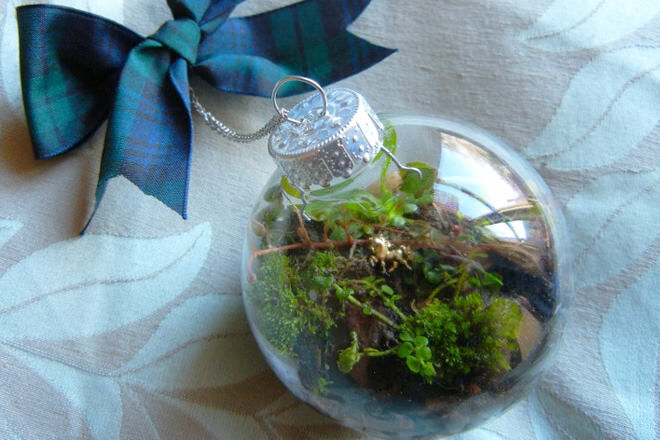 Hunt down greenery and get your hands dirty to create these mini terrarium baubles. 
