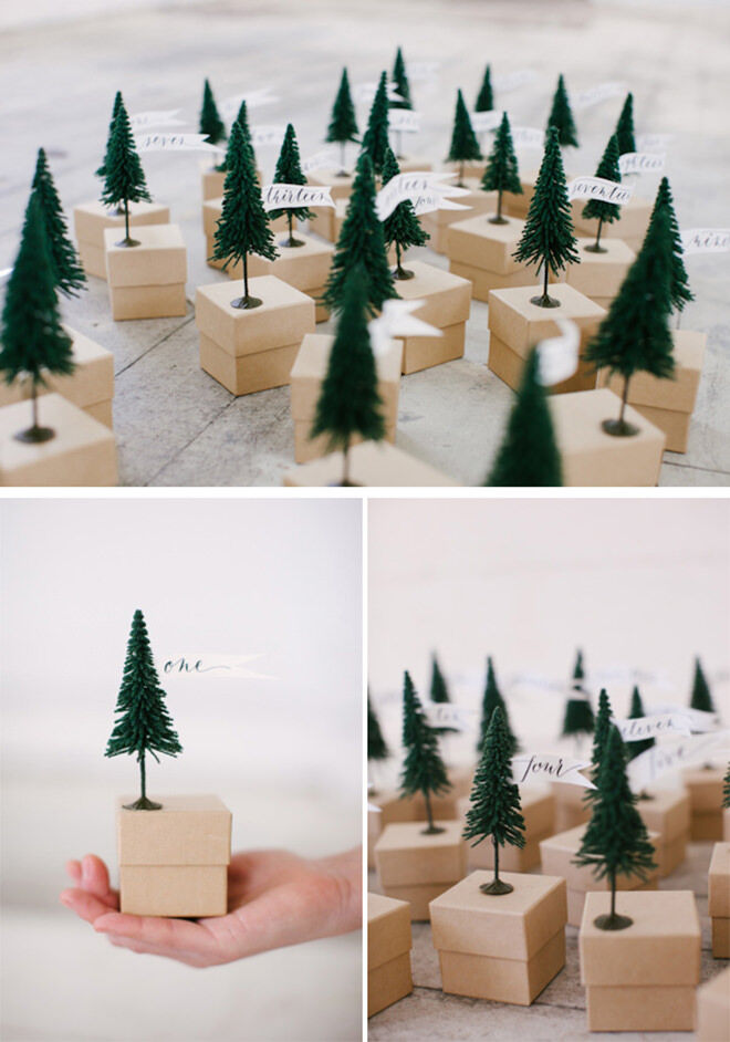 Attaching little Christmas trees to boxes is a simple way to create a beautiful advent calendar you will be proud to display