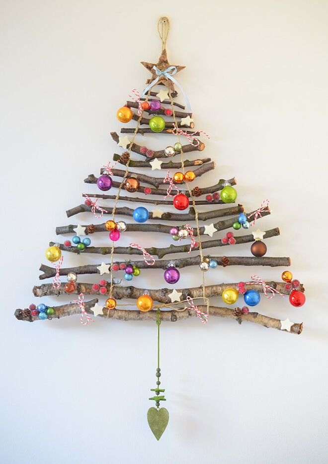 Get back to nature and collect a handful of branches for a rustic Christmas wall hanging