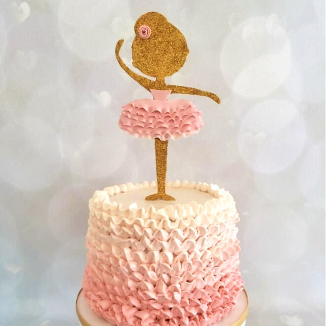 Ballerina cake with gold and pink cake topper