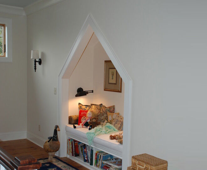 Alcoves in the hallways can be used to create a sweet reading nook just like this one