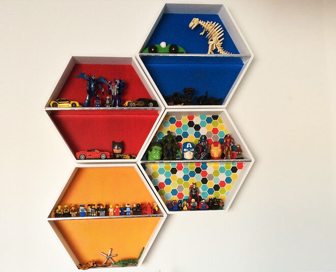 Kmart Hexagon Shelf stacked together to create fun wall art and shelving