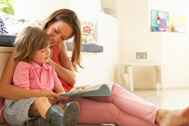 Mother reading with son