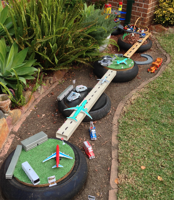 Small World Play. How to build a backyard racing track.