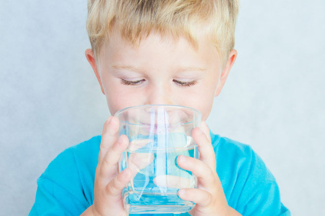 Boy drinking water