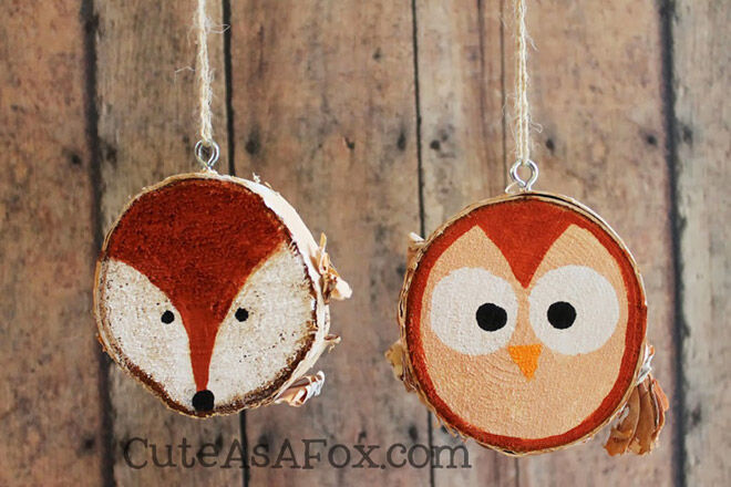 Wooden branch slices painted with fox and owl, decorations for Christmas tree