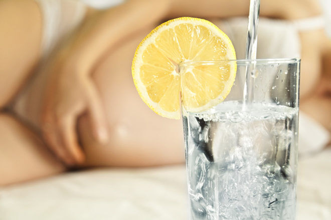 pregnant glass of water & lemon