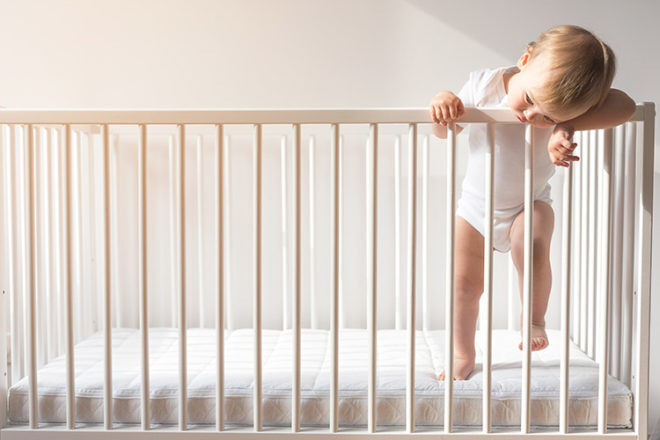 when to move child from cot to bed