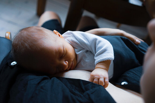 baby fallen asleep while breastfeeding on mother