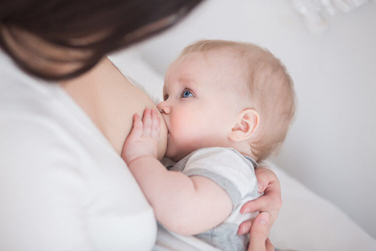 mother breastfeeding her baby