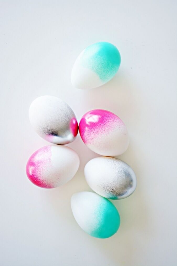 colourful painted easter eggs silver pink and green