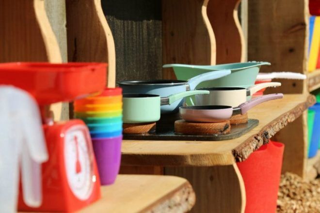 outdoor mud kitchen pots and colourful accessories