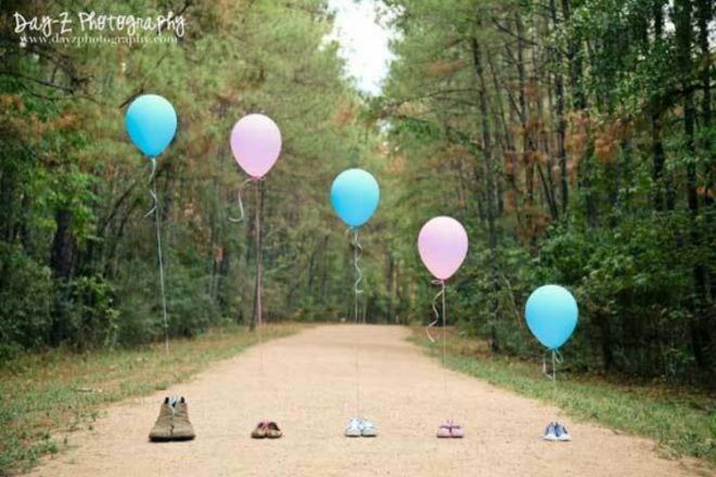 pink and blue balloon pregnancy announcement