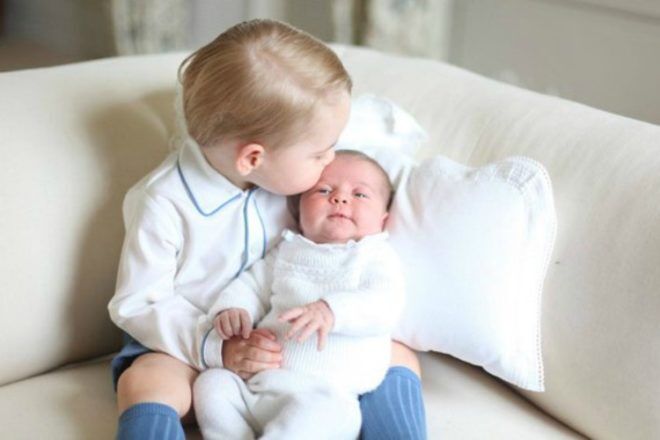Prince George kisses baby Princess Charlotte