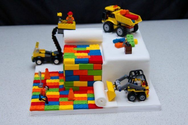 Lego cake with bricks and construction figurines