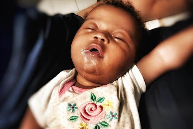 baby with milk face