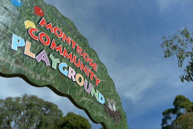 Montrose Community Playground sign with sky in the background
