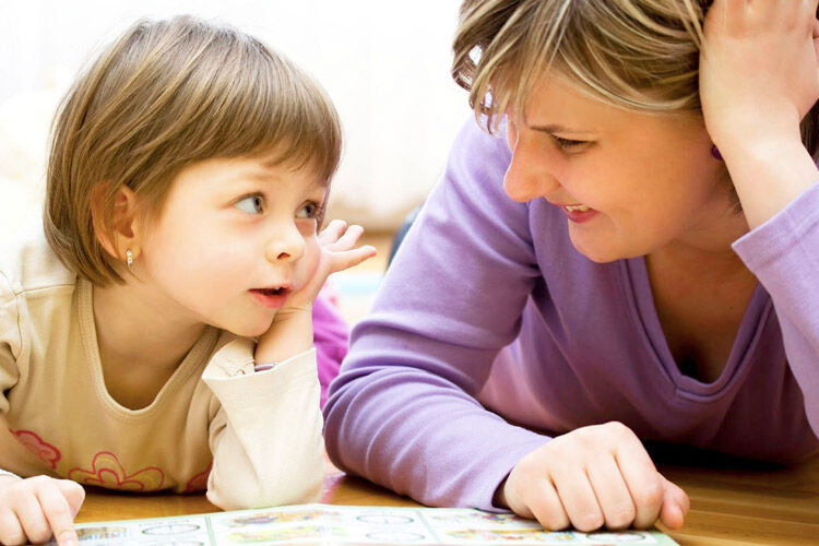 Mum talking to her child