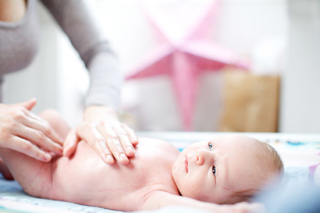 Baby massage on a change table 