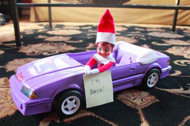 elf on the shelf arrival in a purple convertable