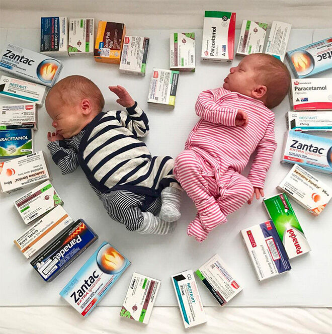 Twins surrounded by morning sickness medication